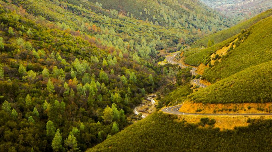 winding Mountain Road on slope, scenic landscape