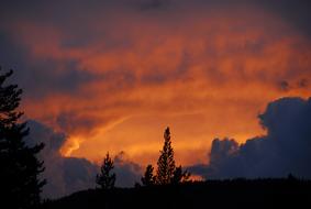 fiery evening clouds over yellowstone national park