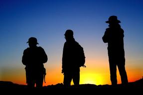 Hikers Silhouettes Sunset