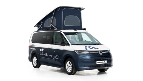 new vw california ocean as roadsurfer campervan sunrise suite in dark blue with pop up roof from the sideview