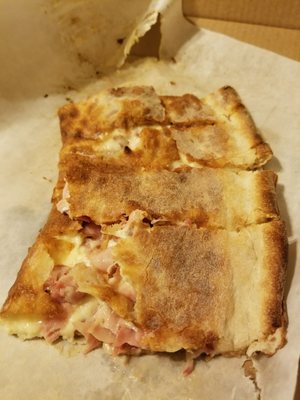 Photo of Vinnie's Pizza - Malden, MA, US. Calzone before opening a slice to view meat