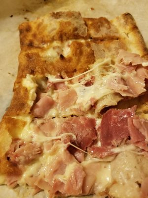 Photo of Vinnie's Pizza - Malden, MA, US. Italian cold cut calzone, some slices have all the meats some don't ):