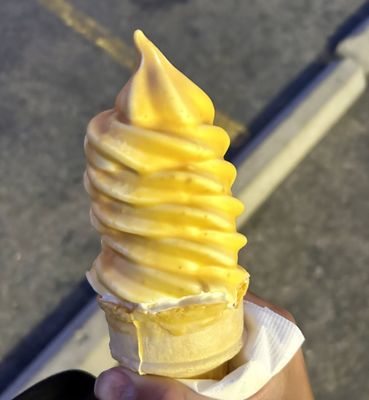 Photo of Mono Cone - Lee Vining, CA, US. Large Vanilla Cone dipped in Butterscotch dipping.