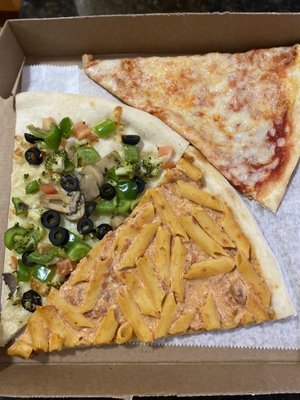 Photo of Trio Pizzeria - Brooklyn, NY, US. two slices of pizza in a box