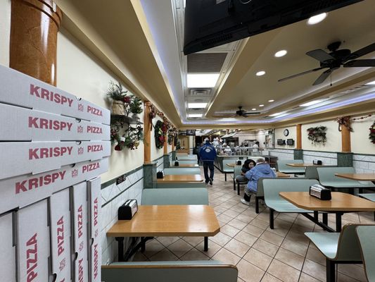 Photo of Krispy Pizza  - Brooklyn, NY, US. he inside of a krispy kremps pizza parlor