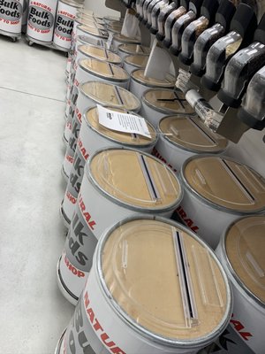 Photo of WinCo Foods - Hillsboro, OR, US. Empty bulk bins during quarantine. No joke I thought they were all full of brown sugar. Lol.