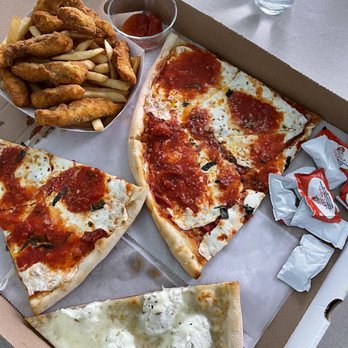 Sicilian Pizza Slice, White Pizza Slice, chicken tenders and fries.