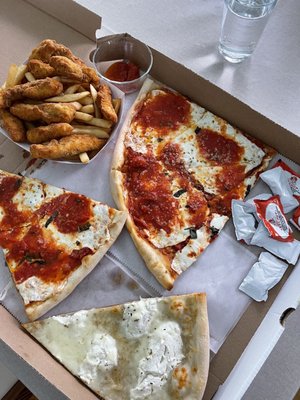 Photo of Trio Pizzeria - Brooklyn, NY, US. Sicilian Pizza Slice, White Pizza Slice, chicken tenders and fries.