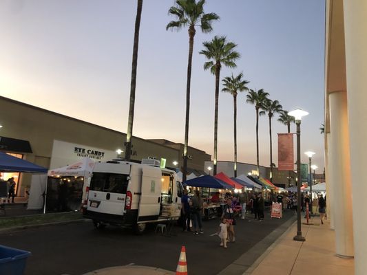 Photo of River Park Farmers Market - Fresno, CA, US. palm trees in the background