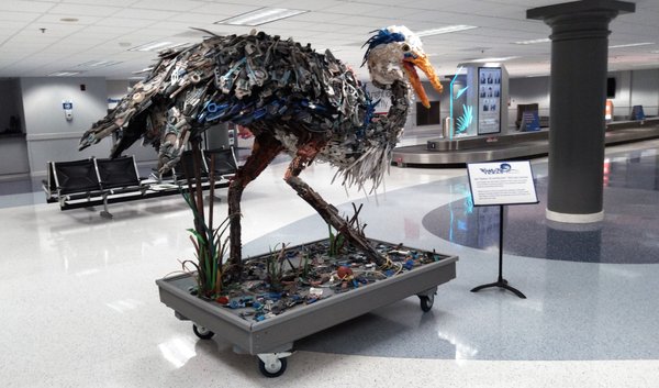 Photo of Valley International Airport - HRL - Harlingen, TX, US. You can't help but notice this Big Bird-alike sculpture in baggage claim made of recycled materials found along the Texas coast.