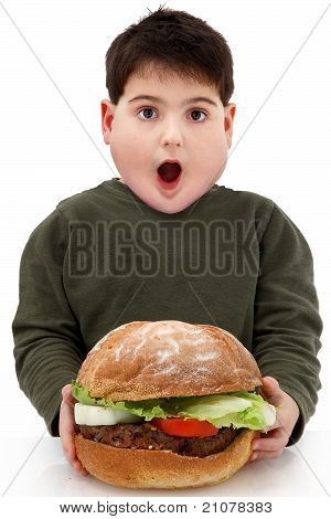 Otyłych chłopiec głodny gigant Burger