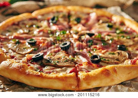 Pizza Restaurant Menu - Delicious Fresh Pizza with Bacon and Mushrooms. Pizza on Rustic Wooden Table with Ingredients