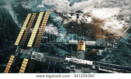 ISS with solar panel revolve over Earth atmosphere. International Space Station orbiting planet. Realistic America continent. 3d animation. Elements of this image furnished by NASA