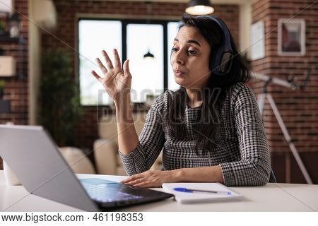 Female Freelancer Attending Videocall Conference On Laptop, Talking To People At Online Business Mee