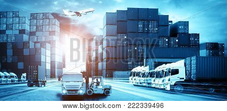 Logistics and transportation of Container Cargo ship and Cargo plane with working crane bridge in shipyard at sunrise, logistic import export and transport industry background