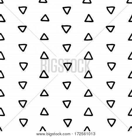 Seamless hand drawn geometric tribal pattern with triangles. Vector navajo design illustration.