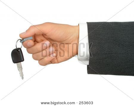 Businessman's Hand Holding Car Key