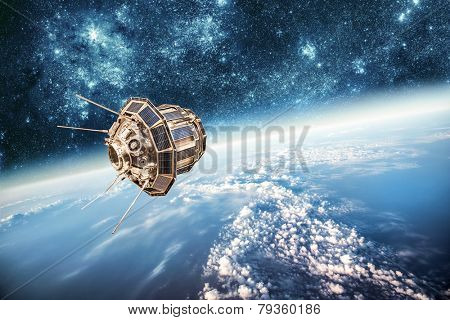 Space satellite orbiting the earth. Elements of this image furnished by NASA.