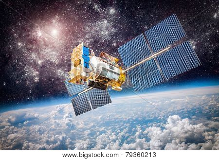 Space satellite orbiting the earth. Elements of this image furnished by NASA.