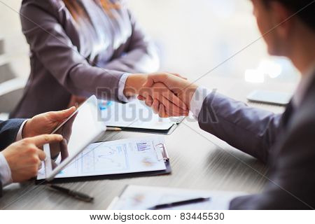 Business people shaking hands