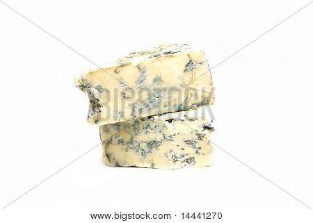 Parmesan cheese with mould isolated on white