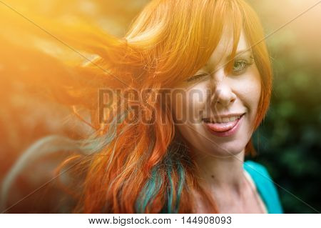 Young Trendy Woman With Colored Bright Red Head