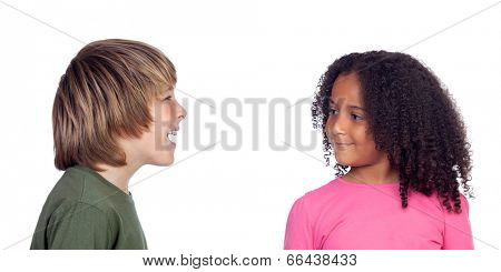 Boy talking with his friend, a beautiful african girl, isolated on a white background