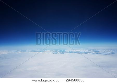 Low Earth Orbit - View Of White Clouds And Mountains During The Flight To The Low Orbit Of The Earth