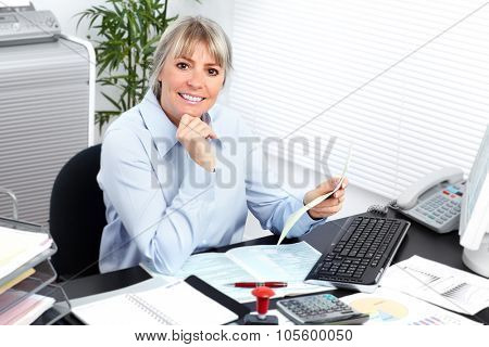 Business woman working in the office. Accounting and finance.