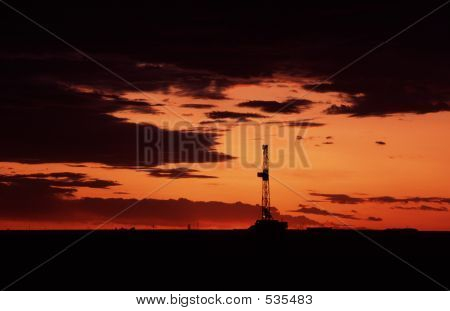 Oil Rig At Sunset