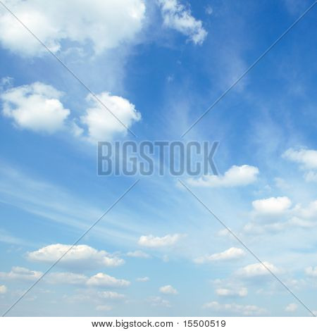 white fluffy clouds in the blue sky