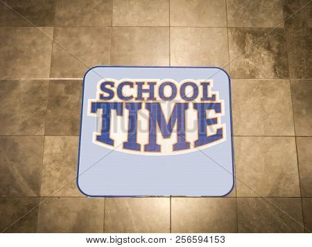 School Time In Blue Color Sign On The Wall