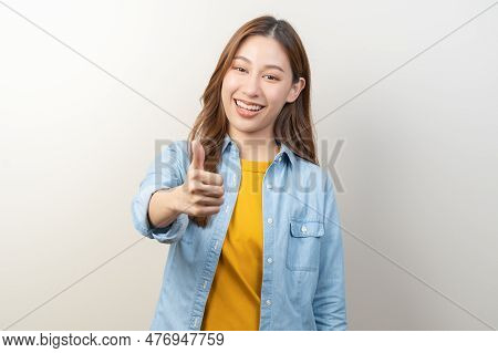 Smiling Positive, Cute Asian Young Woman, Girl Hand Showing Thumb Up, Wearing Casual, Cheerful Portr