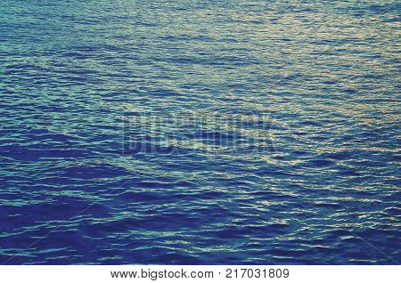 Ocean water texture background.Ocean water surface.Blue ocean.Sea water texture pattern.Filtered,soft focus.