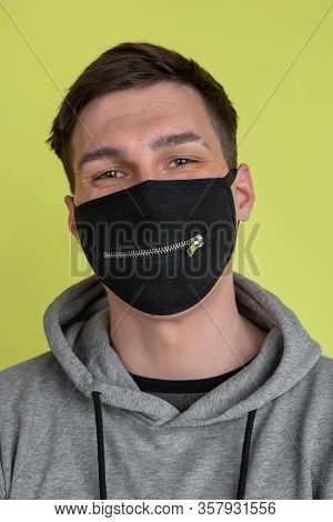 Smiling. Close Up Caucasian Mans Portrait Isolated On Yellow Studio Background. Freaky Male Model In