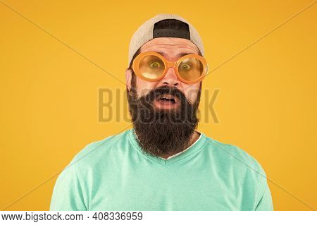 Real Surprise. Freaky Man With Beard And Moustache. Man In Funny Glasses On Yellow Background. Just 