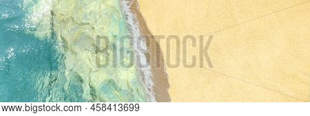 Sea With Waves And Sand View From A Drone, From Above. Sea Coast. Beach Background. Banner. Vacation