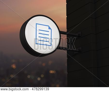 Document Icon On Hanging Black Rounded Signboard Over Blur Of Cityscape On Warm Light Sundown, Techn