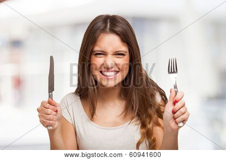 Portrait of a very hungry young woman