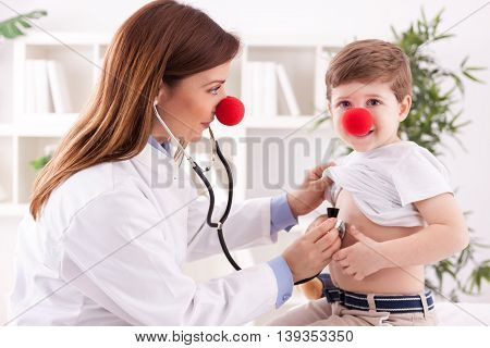 Doctor Pediatrician And Patient Happy Child