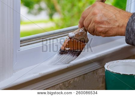 Painting A Wooden Window Paint With Paintbrush While Painting Window Trim