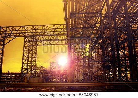 Metal Structure Of Industry Chemical Tube In Heavy Industrial Estate Against Beautiful Sun Rising Wi