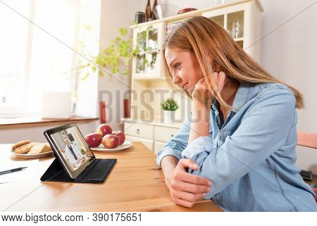 Doctor With A Stethoscope On The Tablet Screen. Digital, Remote Consultation, Telemedicine Or Telehe