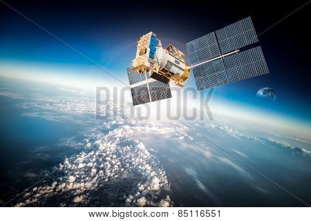 Space satellite orbiting the earth. Elements of this image furnished by NASA.