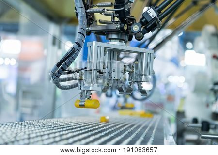 Industrial robot with conveyor in manufacture factory,Smart factory industry 4.0 concept.