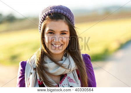 Close Up Portrait Of Cute Teen Girl Outdoors.