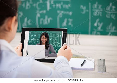 Woman Having Videochat With Digital Tablet