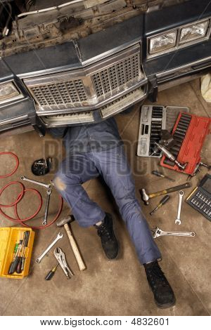 Mechanic Under The Car