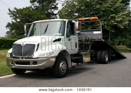 White Flatbed Tow Truck