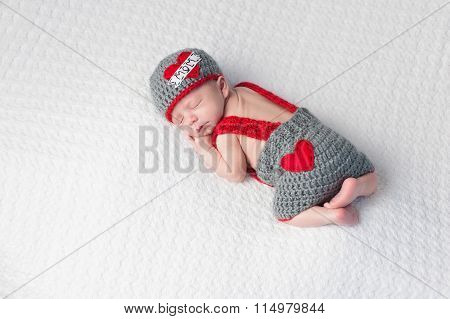 Newborn Baby Boy Wearing A 